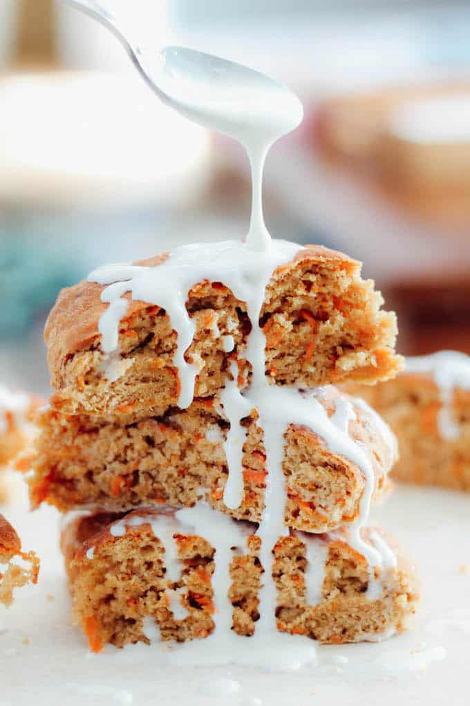 Carrot Cake Scones | Destination Delish - enjoy all the lovely flavors of carrot cake in these lightened up scones drizzled with a decadent cream cheese glaze