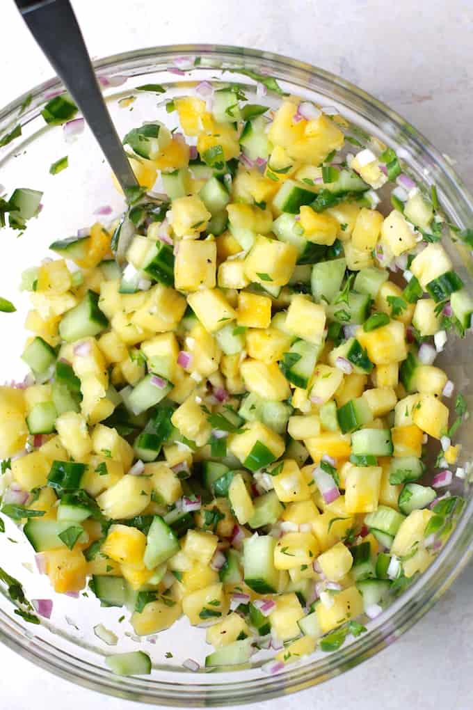 Pineapple Cucumber Salsa | Destination Delish - The perfect summer salsa featuring a sweet and juicy kick from the fresh pineapple and a refreshing crunch from the cucumber. Vegan, gluten free, and healthy! 