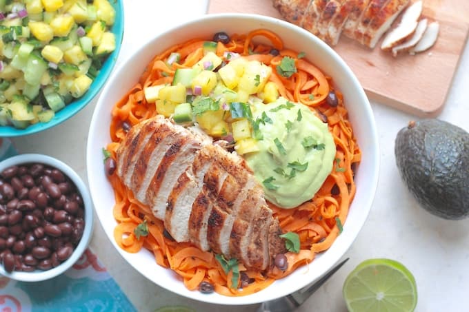 Southwest Grilled Chicken and Squash Noodle Bowls | Destination Delish - Spice-rubbed grilled chicken and creamy avocado sauce on a bed of sweet, tender butternut squash noodles. A clean eating and gluten free recipe!