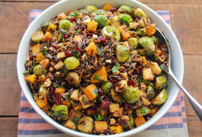 Butternut Squash, Brussels Sprouts, and Parsnip Toss with Wild Rice, Cranberries, and Feta | Destination Delish