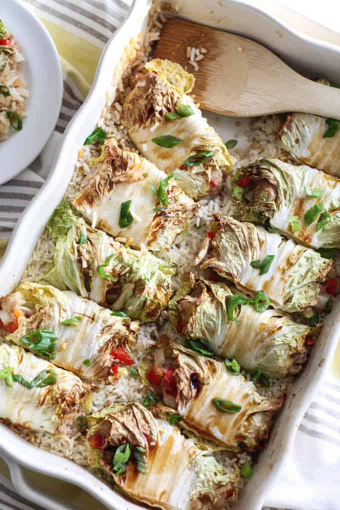 Teriyaki Turkey Cabbage Rolls - A quick and easy Asian-inspired recipe. These healthy cabbage rolls are stuffed with sweet pineapple, chopped veggies, and ground turkey. It’s a wholesome meal perfect for busy weeknights! 
