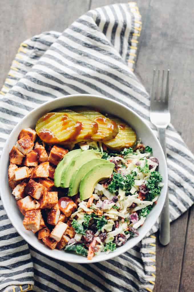 BBQ Chicken Coleslaw Bowls | Destination Delish – a healthy bowl full of tender chicken and coleslaw topped with pickles and creamy avocado slices! It’s everything you love about summer barbecues in a bowl!