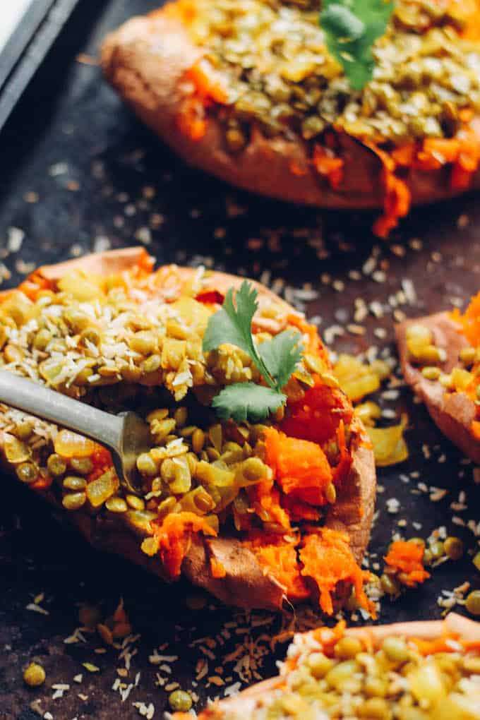 Curry Lentil Stuffed Sweet Potatoes | Destination Delish - Tangy, curry lentils tucked inside a tender sweet potato. It’s a healthy side or main dish that’s easy to prepare and full of flavor! Vegetarian. Vegan. Gluten free.