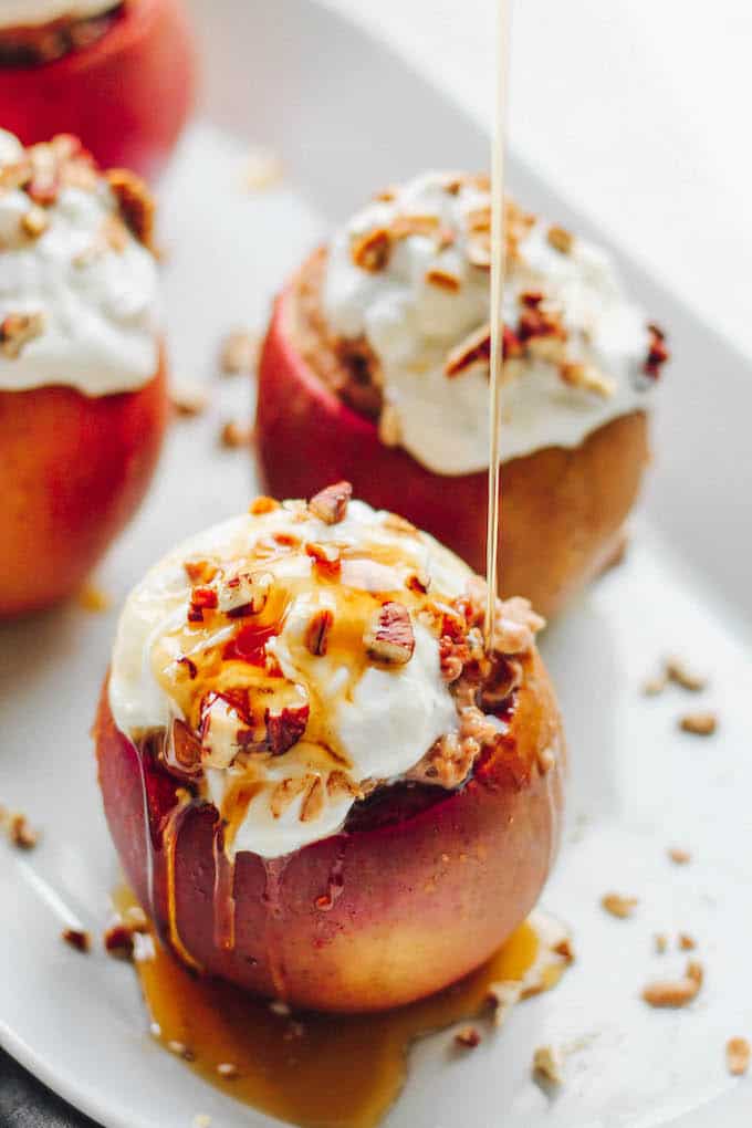 Baked Apples with Cinnamon Spice Oatmeal | Destination Delish - sweet and tender baked apples stuffed with creamy cinnamon spiced oatmeal. It’s a cozy breakfast that will warm you up on a chilly morning! 