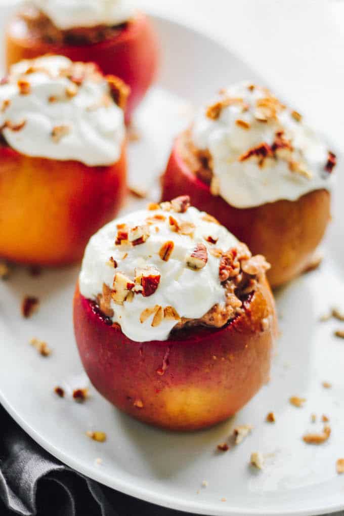 Baked Apples with Cinnamon Spice Oatmeal | Destination Delish - sweet and tender baked apples stuffed with creamy cinnamon spiced oatmeal. It’s a cozy breakfast that will warm you up on a chilly morning!