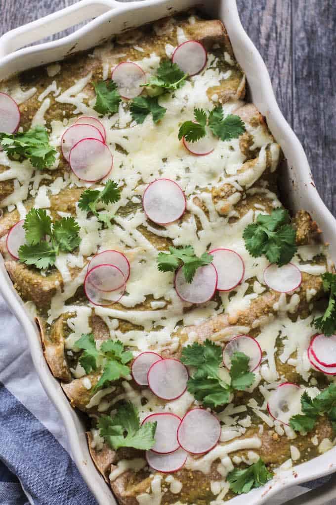 Cauliflower Sweet Potato Enchiladas | Destination Delish - hearty vegetarian enchiladas that are easy to make and full of healthy vegetables. It's a wholesome and comforting dish perfect for cold winter months! 