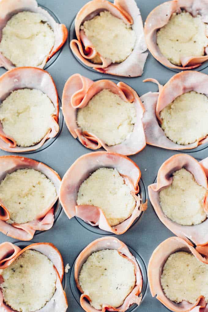 Hawaiian Cauliflower Pizza Cups | Destination Delish - cauliflower pizza crust, pineapple, and mozzarella cheese packed inside a ham cup! A healthy bite-sized appetizer!