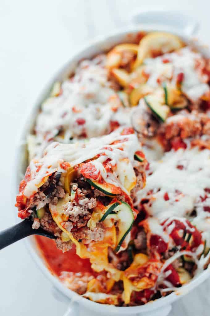 Spiralized Zucchini Lasagna Casserole | Destination Delish - Layers of zucchini noodles, ground turkey, marinara sauce and cheese. Healthy comfort food perfect for an easy weeknight dinner! 