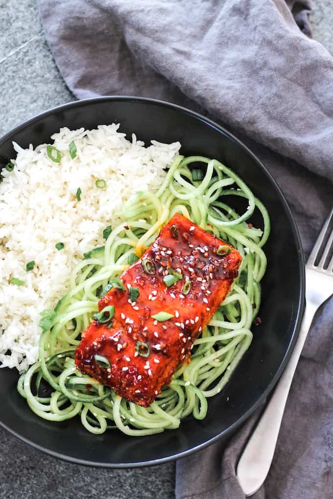 Sweet Glazed Korean Salmon over Sesame Cucumber Noodles | Destination Delish - sweet, tangy, saucy salmon served on a bed of crisp cucumber noodles. Fancy enough to serve guests and easy enough to make on a busy weeknight! 