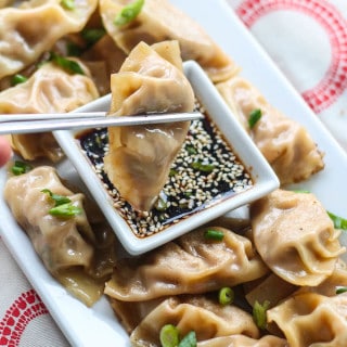 Kimchi Pineapple Dumplings | Destination Delish - A unique take on the traditional Chinese dumpling. This sweet and spicy appetizer is filled with ground turkey, pineapple, and kimchi