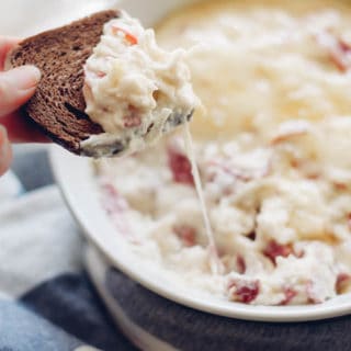 Lightened Up Reuben Dip | Destination Delish - A rich and creamy reuben dip made lighter with cauliflower and light cream cheese. Enjoy with pita chips, rye bread, or veggies!
