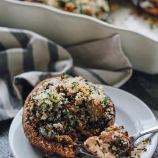 Wild Rice Stuffing Portobellos | Destination Delish - Hearty wild rice and mushroom stuffing served inside portobello mushroom caps. It’s a wholesome and unique take on the traditional Thanksgiving side dish!