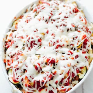 Spiralized Zucchini Lasagna Casserole | Destination Delish - Layers of zucchini noodles, ground turkey, marinara sauce and cheese. Healthy comfort food perfect for an easy weeknight dinner!