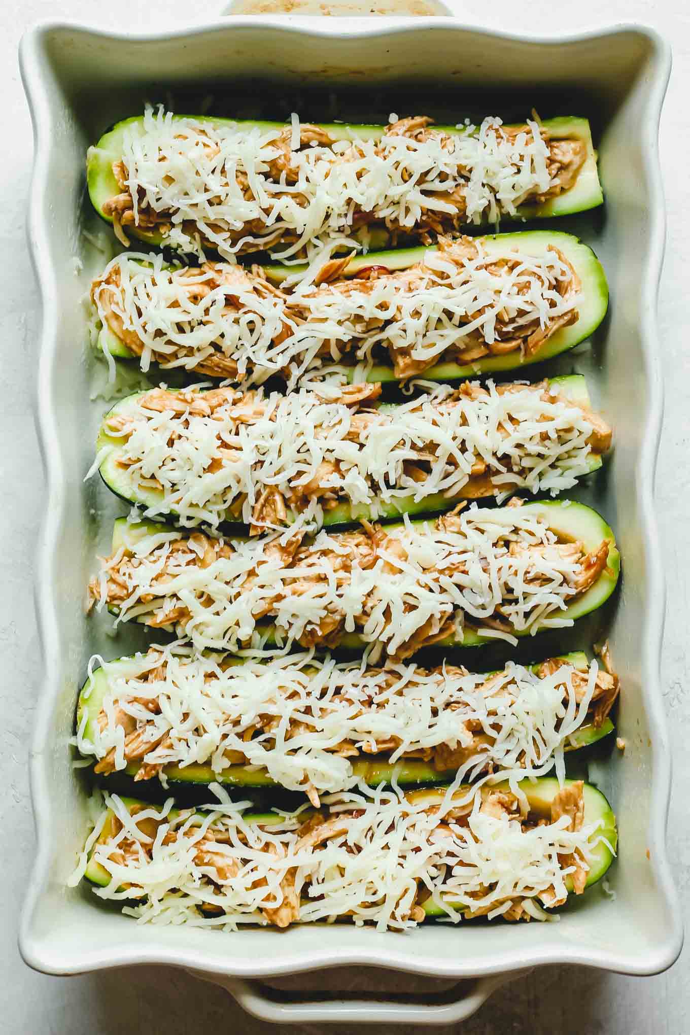 Zucchini boats stuffed and ready for the oven