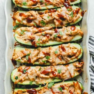 BBQ Chicken Zucchini Boats in a baking dish fresh out of the oven