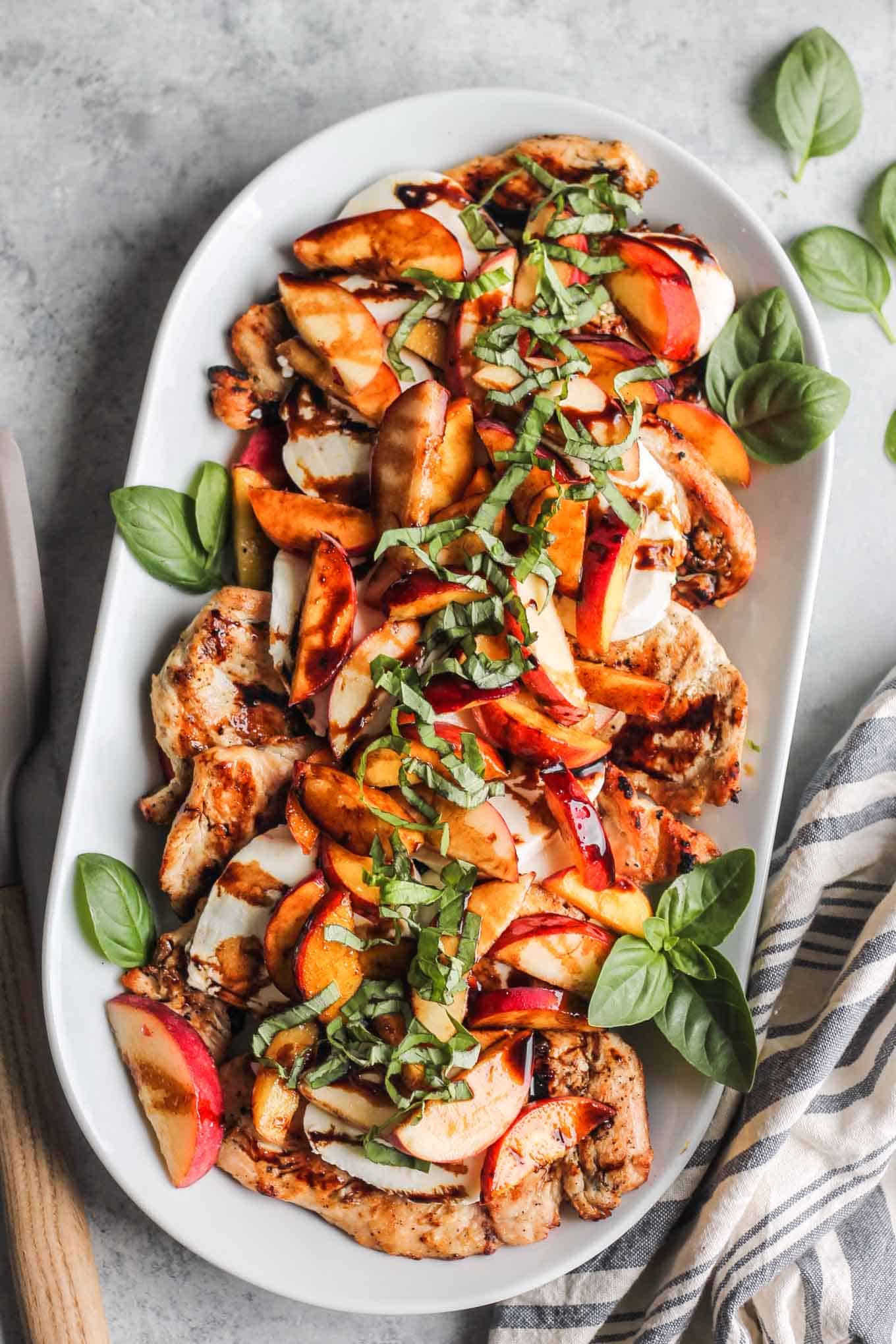 The Peach Caprese Grilled Chicken on a serving platter.